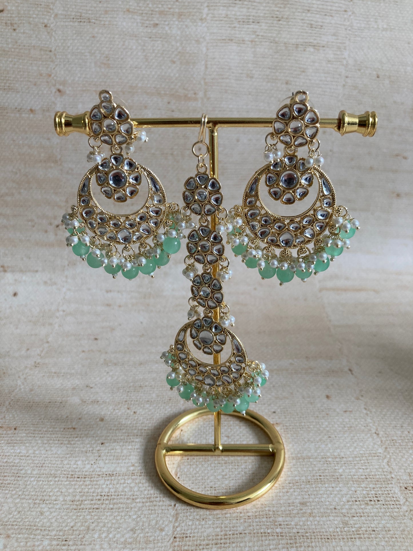 Ila Mint Green Gold Plated Kundan Earrings And Tikka Set (ST943)