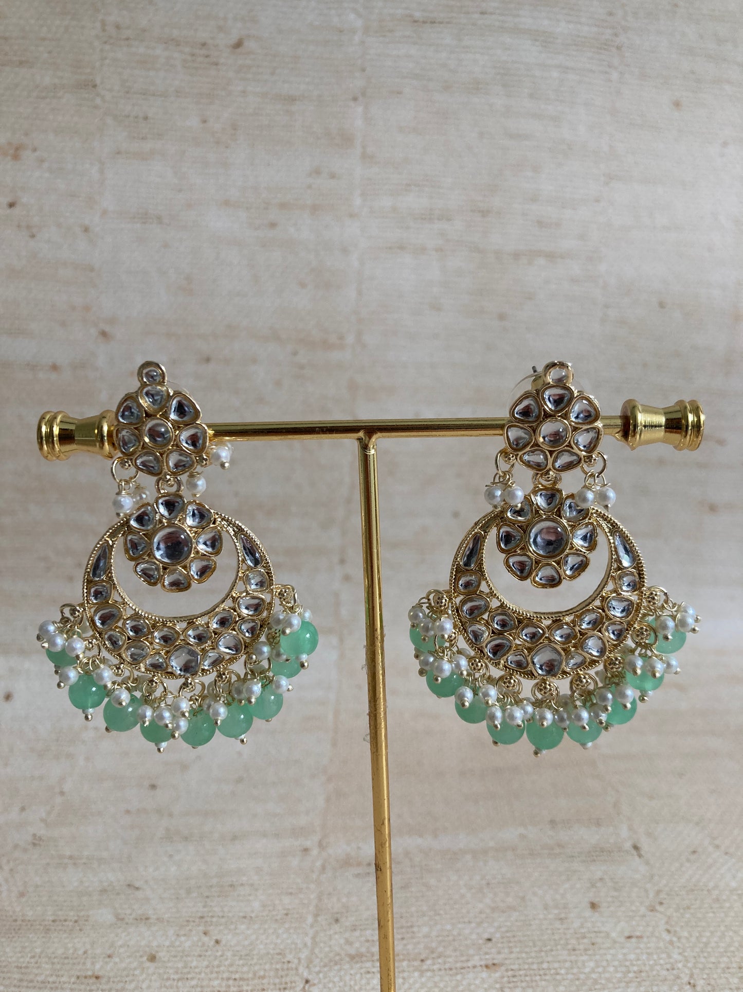 Ila Mint Green Gold Plated Kundan Earrings And Tikka Set (ST943)