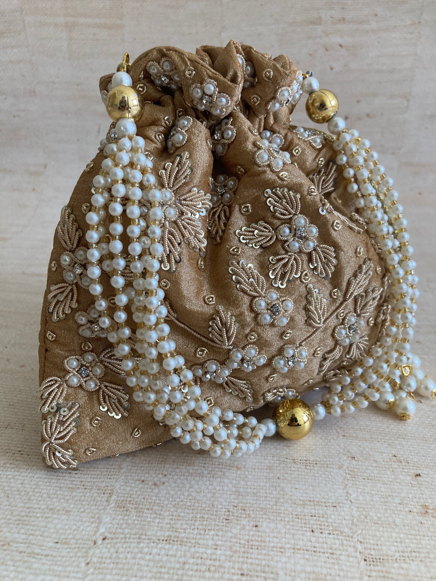 Simran Bronze Pearl Potli Bag (ST810)