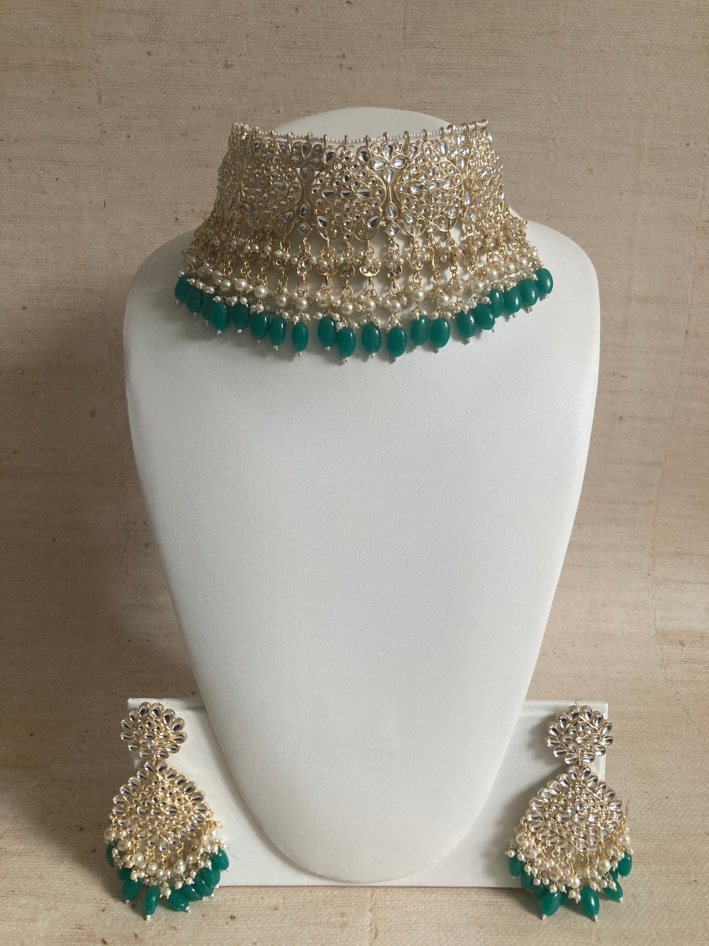 Maira Emerald Green Beaded Gold Plated Kundan Set (ST219)